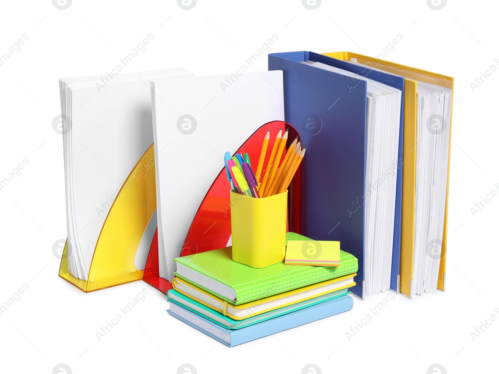 Photo of Bright office folders and different stationery isolated on white