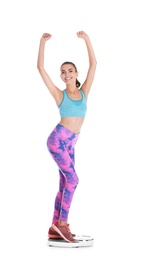 Photo of Happy young woman measuring her weight using scales on white background. Weight loss motivation