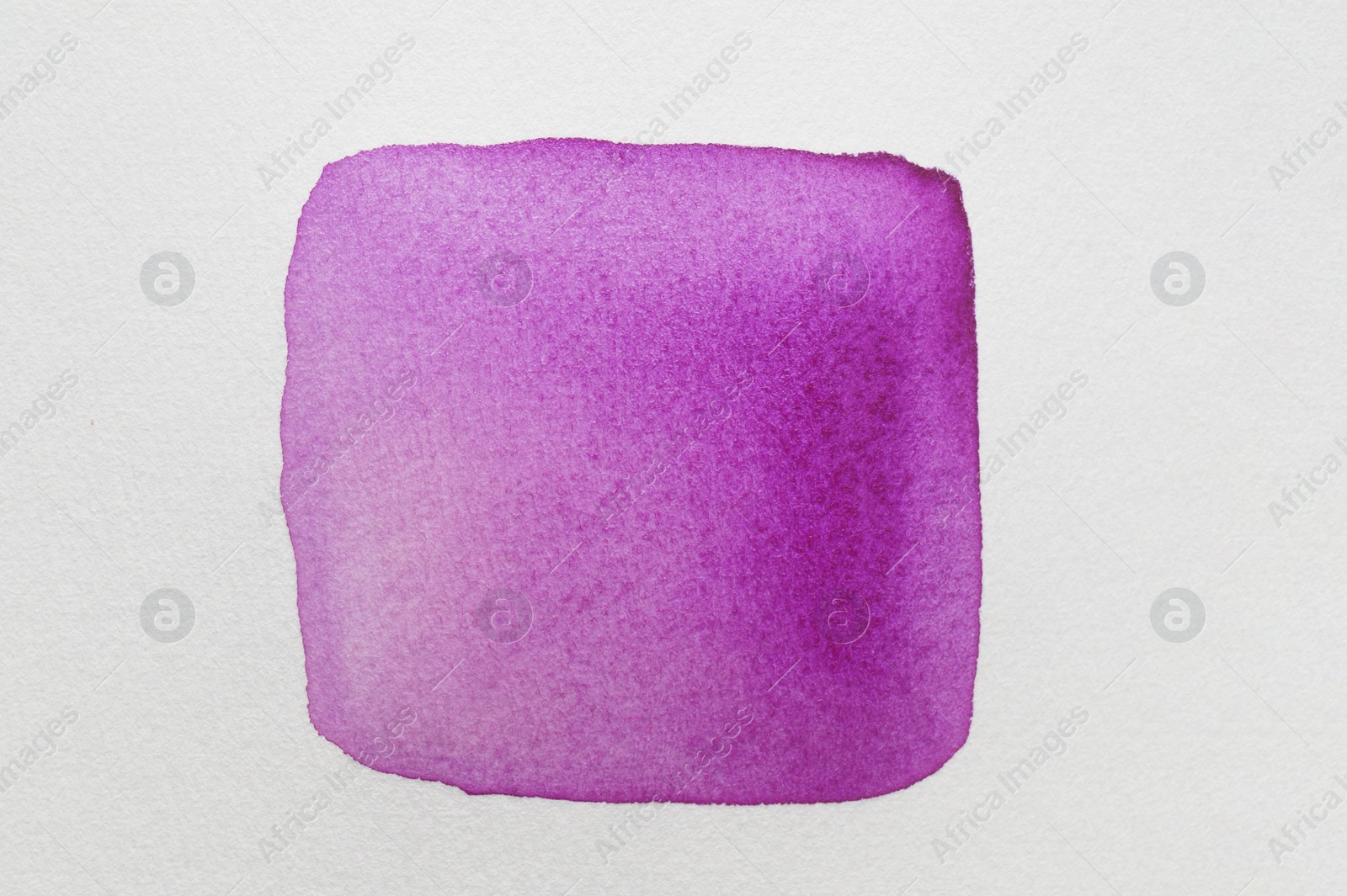 Photo of Square drawn with purple watercolor paint on white background, top view
