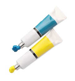 Photo of Tubes with oil paints on white background, top view