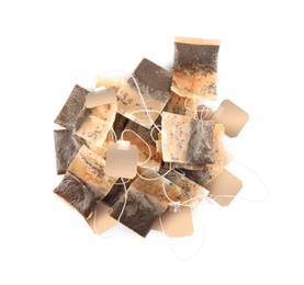 Photo of Used tea bags on white background, top view