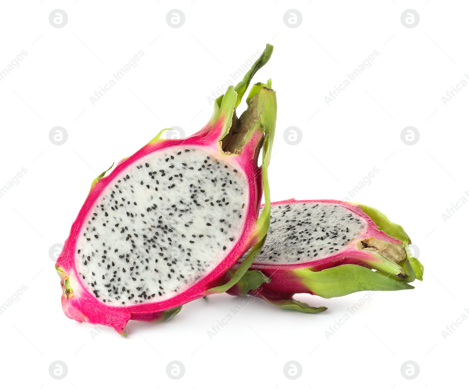 Photo of Halves of delicious dragon fruit (pitahaya) on white background