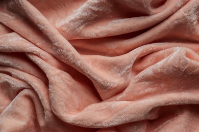 Beautiful pink fabric as background, top view