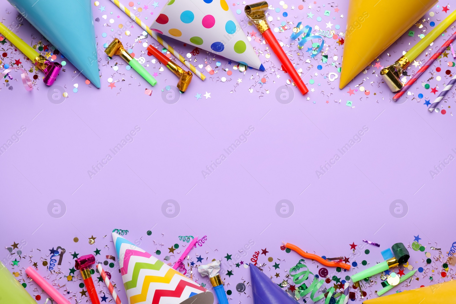 Photo of Beautiful flat lay composition with festive items on violet background, space for text. Surprise party concept