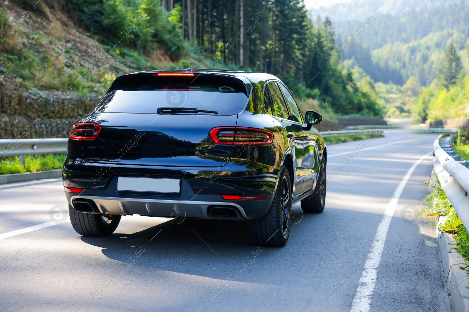 Photo of Picturesque view of asphalt road with cars