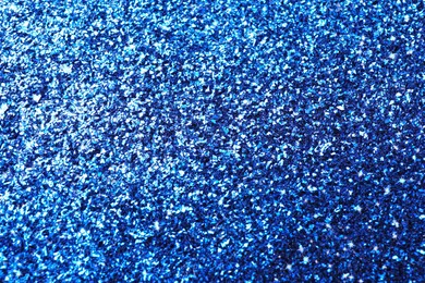 Image of Beautiful shiny blue glitter as background, closeup