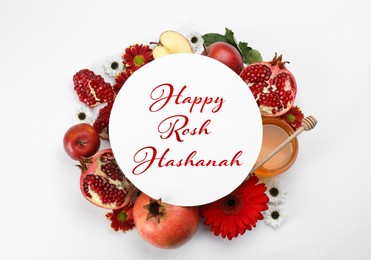 Flat lay composition with Rosh Hashanah holiday attributes and card on white background 