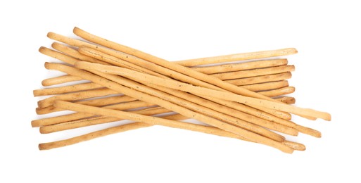 Delicious grissini sticks on white background, top view