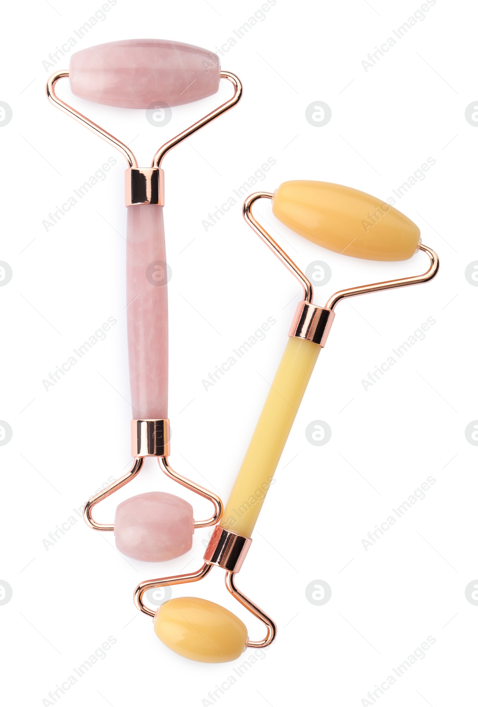 Photo of Different natural face rollers on white background, top view