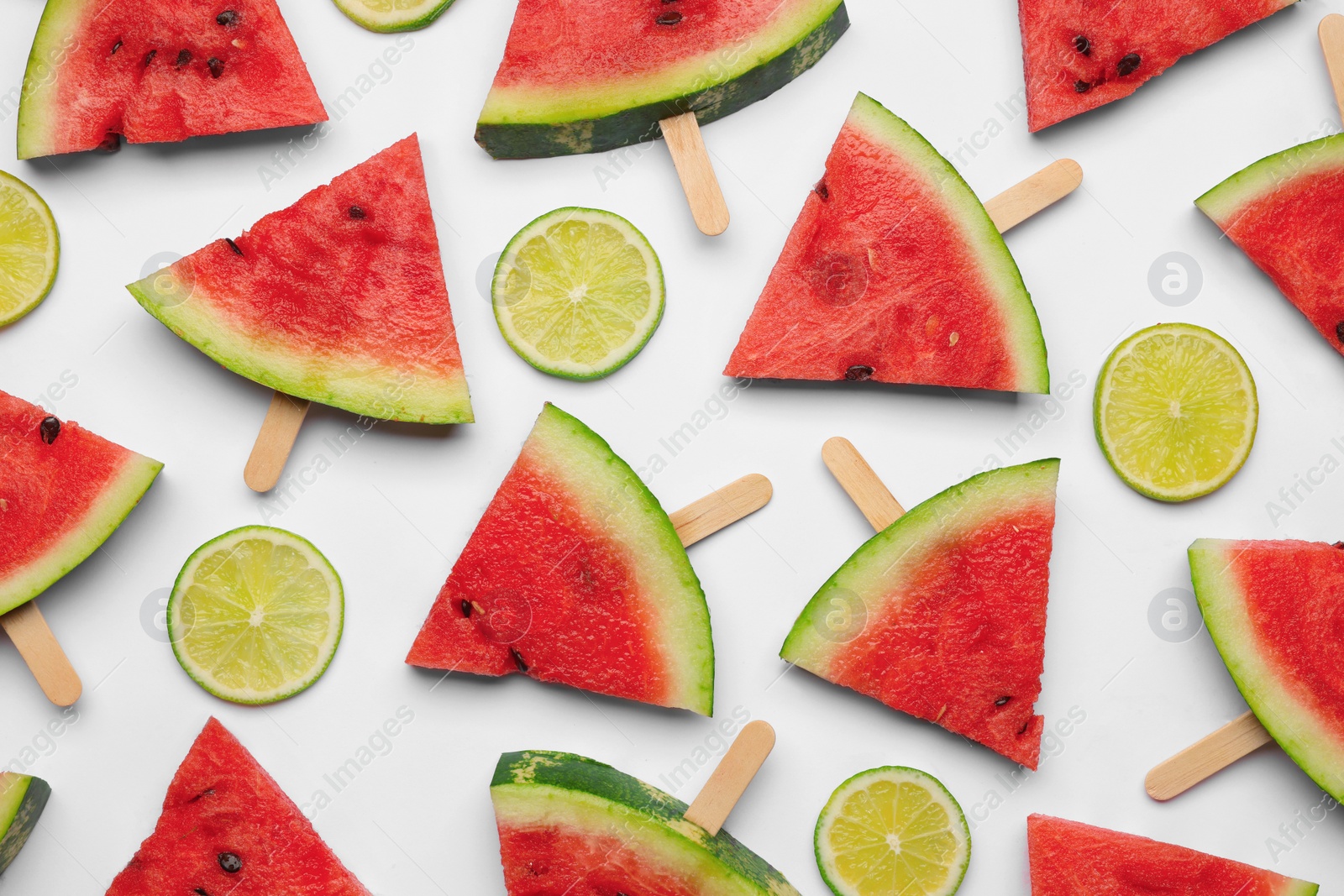 Photo of Tasty sliced watermelon and lime on white background, top view