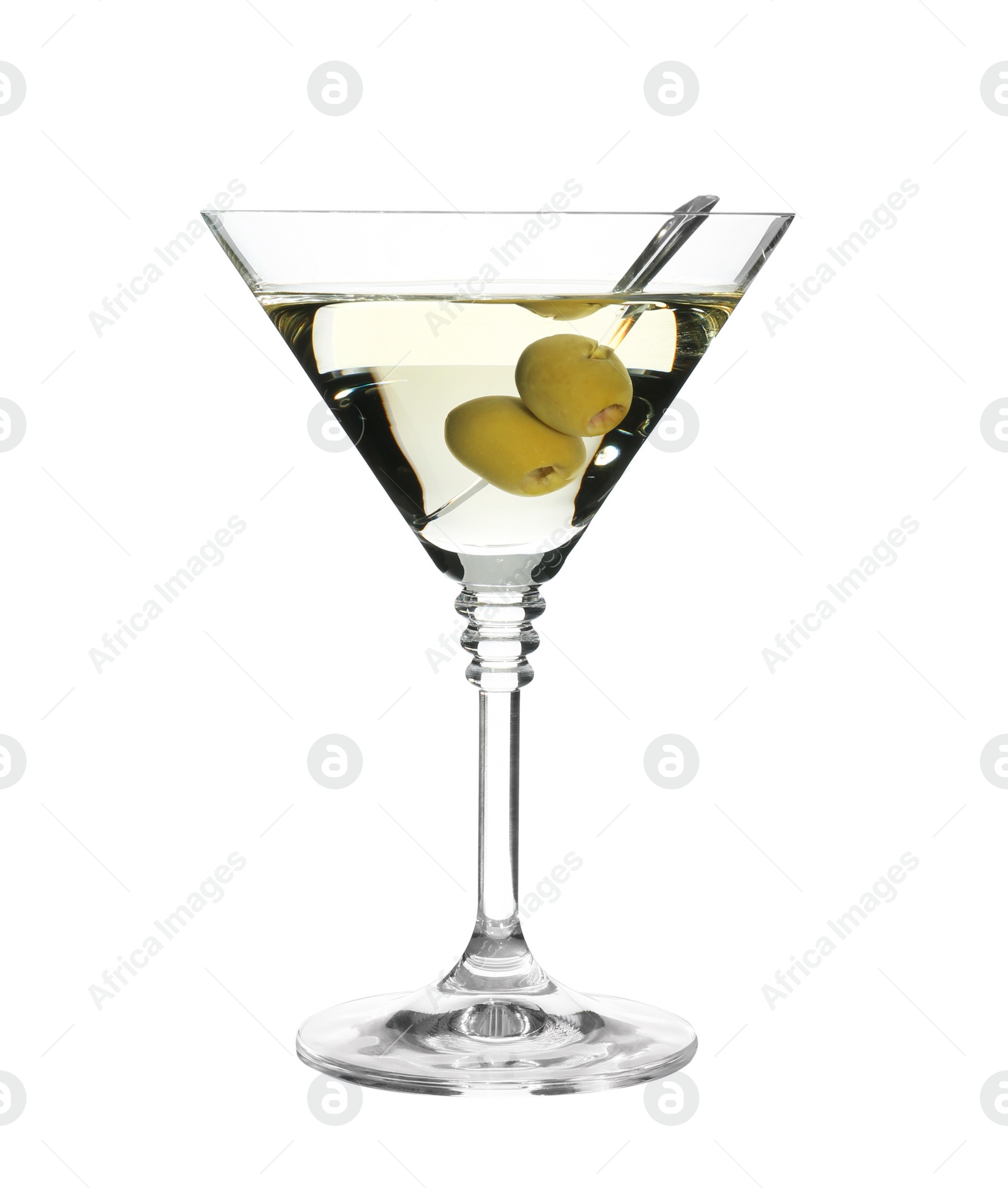 Photo of Glass of classic martini cocktail with olives on white background