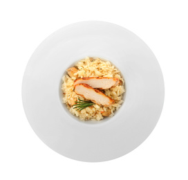 Photo of Delicious chicken risotto isolated on white, top view