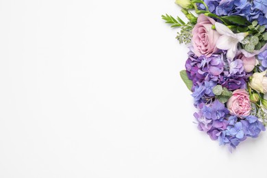 Beautiful composition with hortensia flowers on white background, flat lay. Space for text