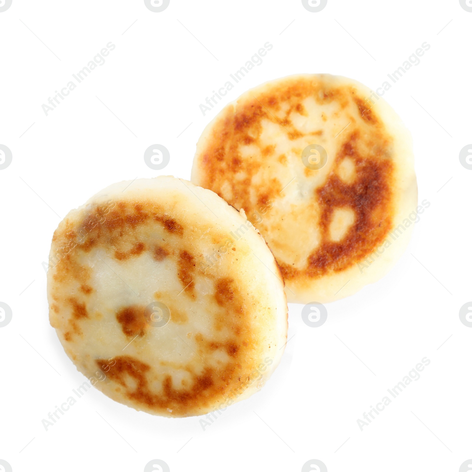 Photo of Delicious cottage cheese pancakes isolated on white, top view