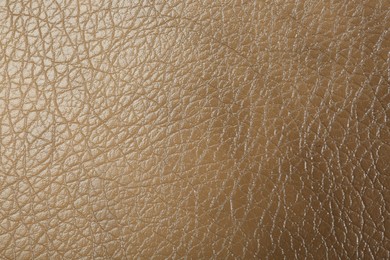 Texture of beige leather as background, top view