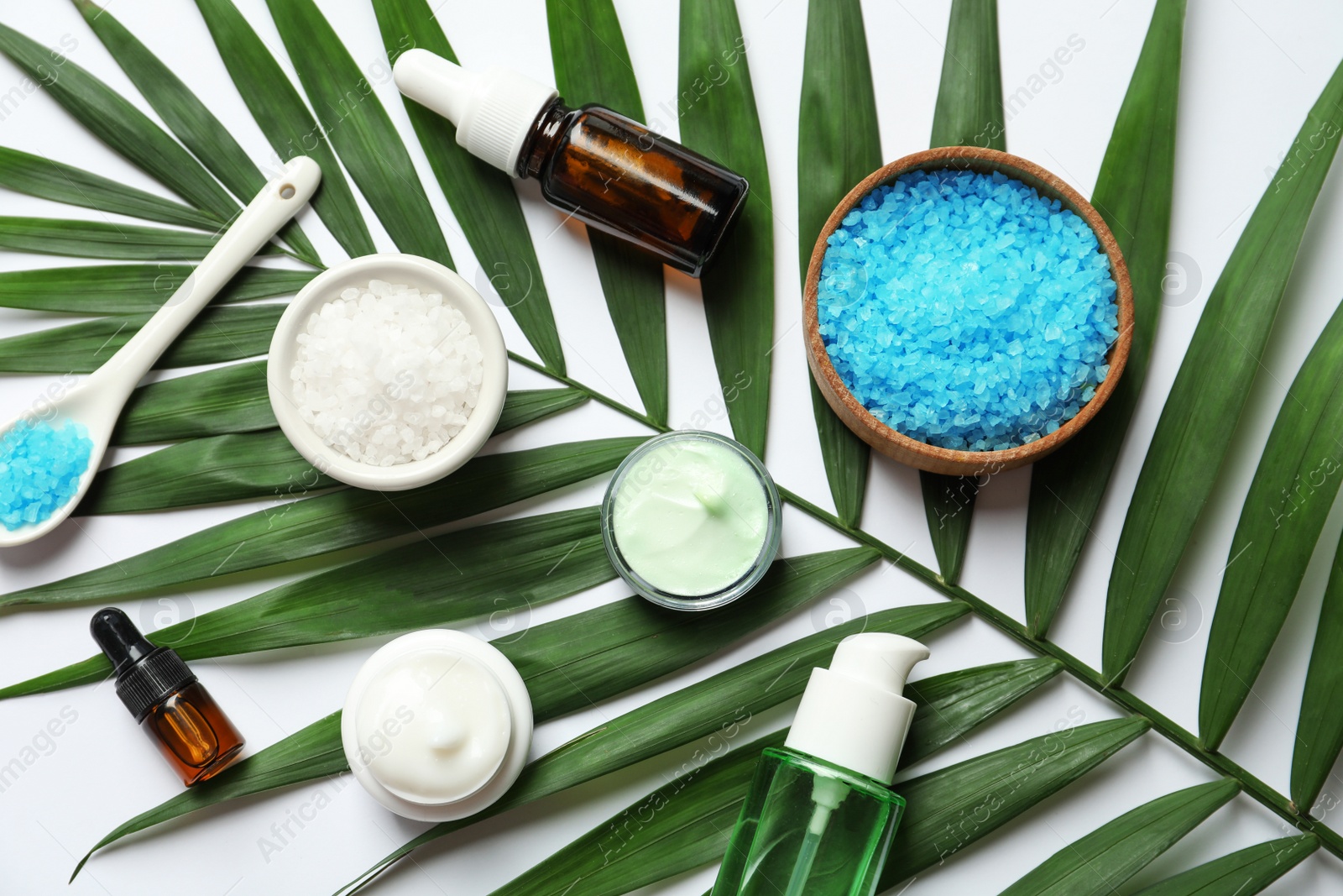 Photo of Flat lay composition with cosmetic products on white background