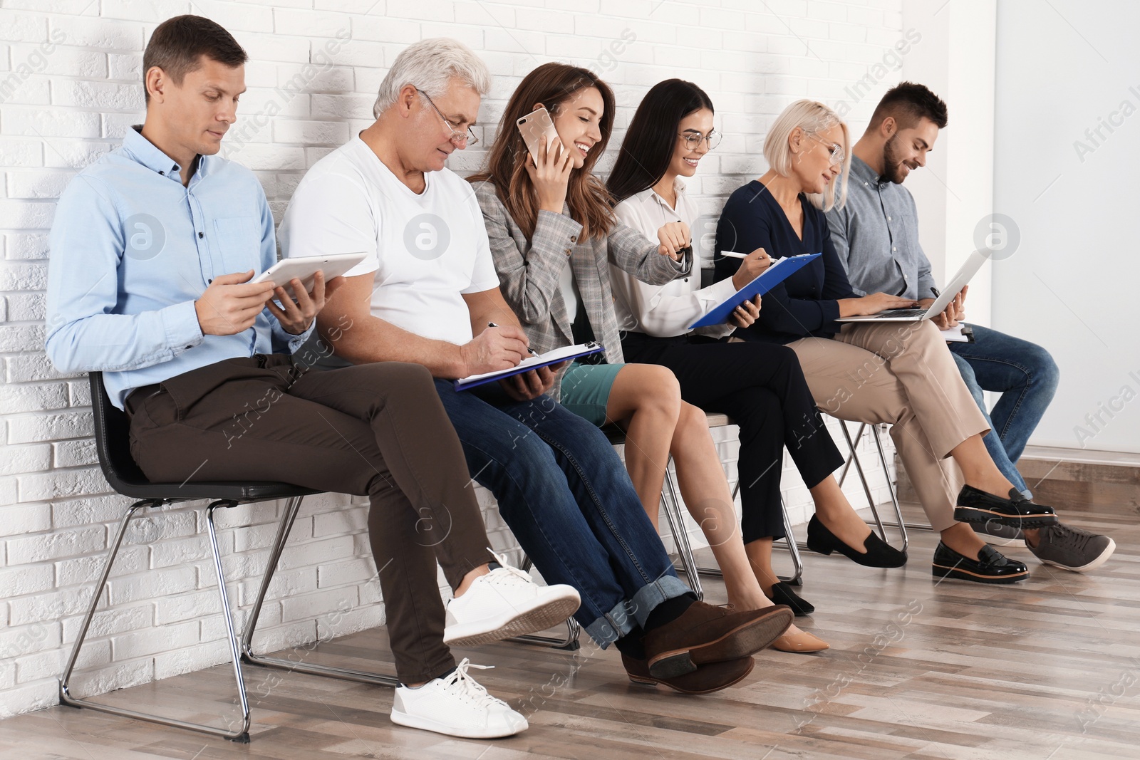 Photo of People waiting for job interview in office