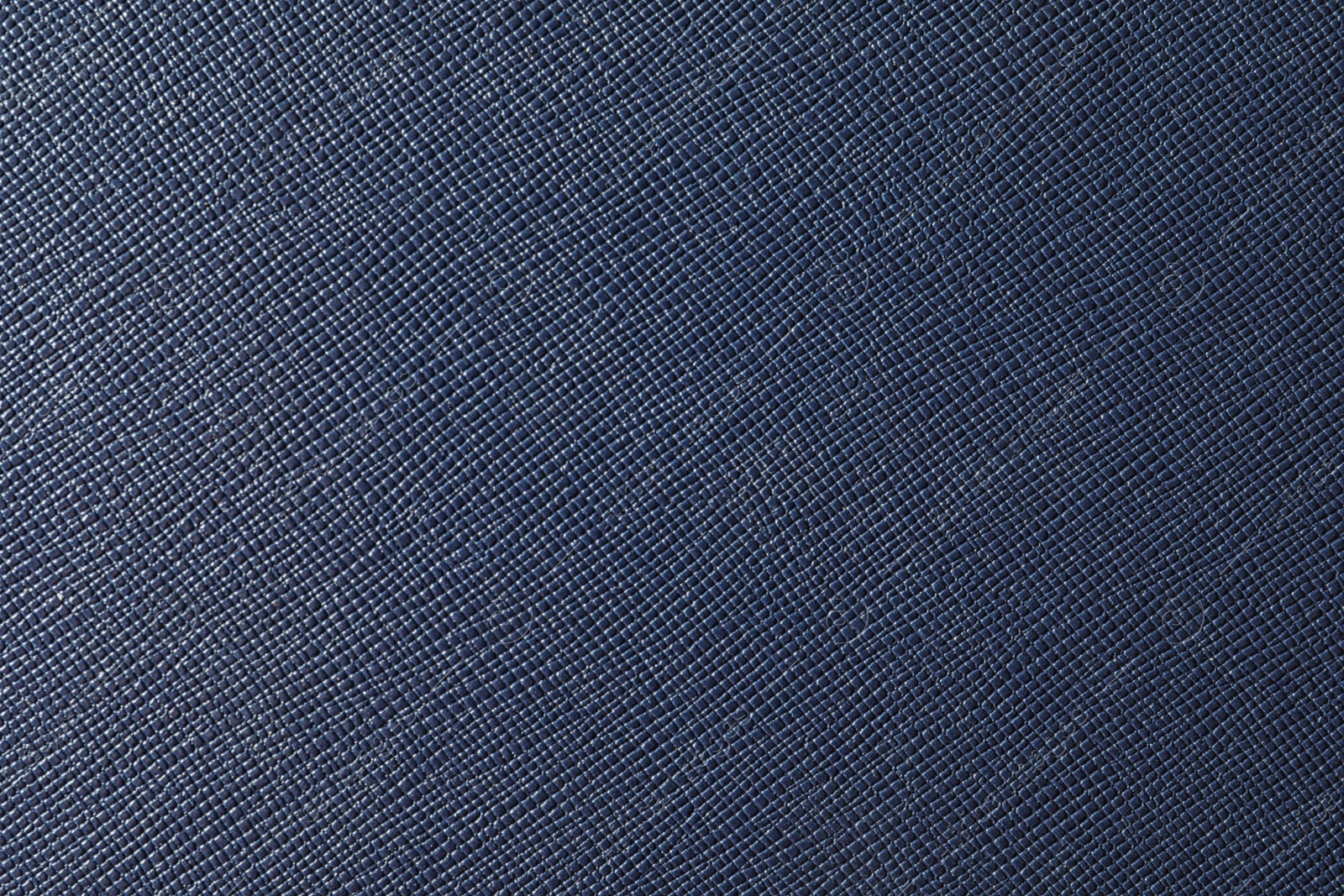 Photo of Texture of dark blue leather as background, closeup