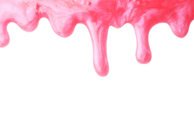 Photo of Flowing pink slime on white background. Antistress toy