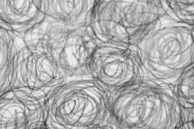 Photo of Circles drawn with pencil on white background, closeup