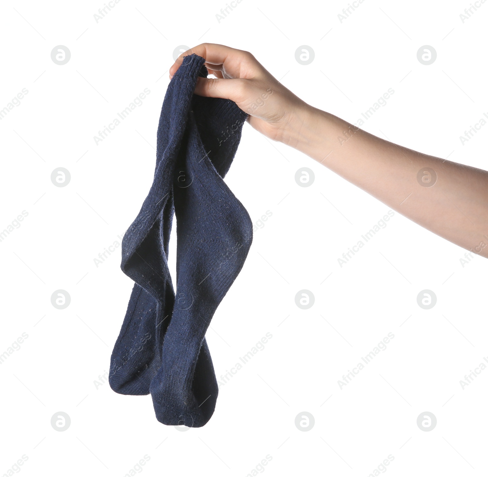 Photo of Woman holding dirty socks on white background, closeup