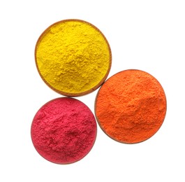 Colorful powders in bowls on white background, top view. Holi festival celebration