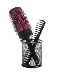 New modern hair brush and comb in metal holder isolated on white