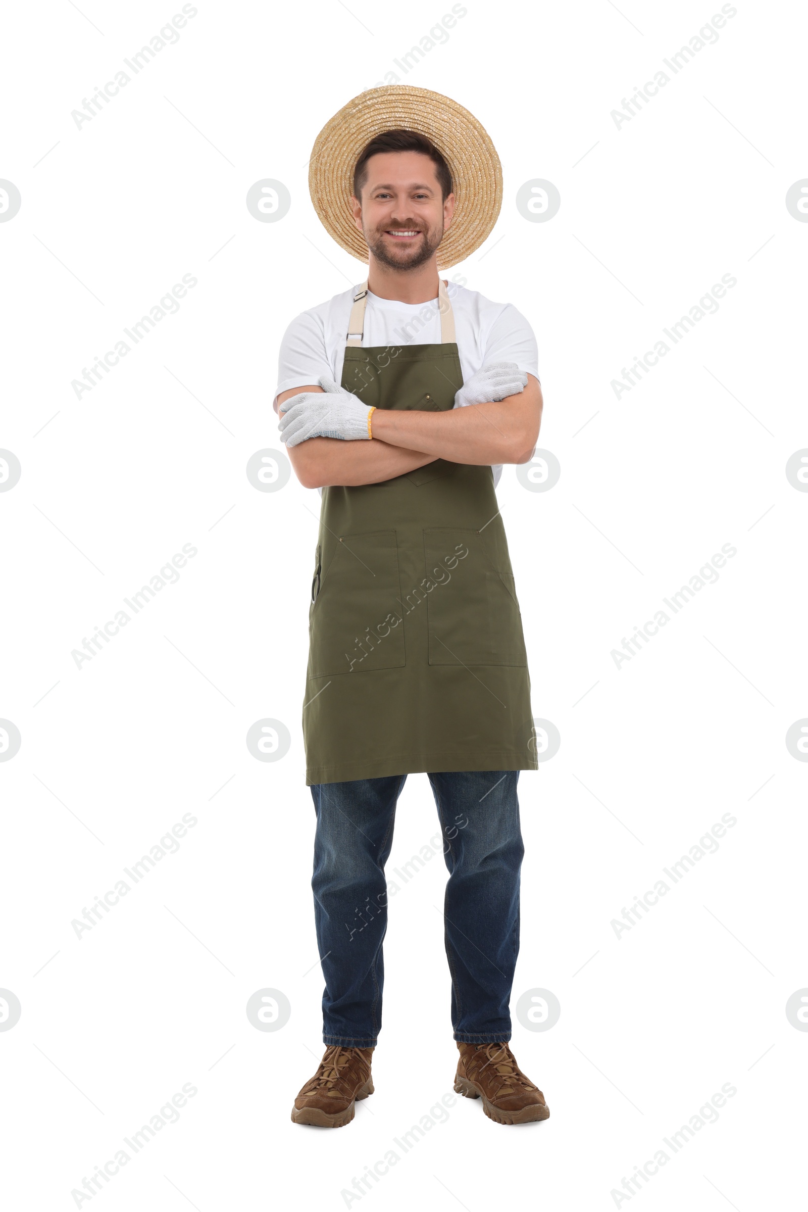 Photo of Smiling farmer with crossed arms on white background. Harvesting season