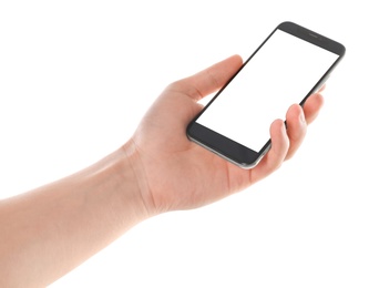 Photo of Man holding smartphone with blank screen on white background, closeup of hand. Space for text