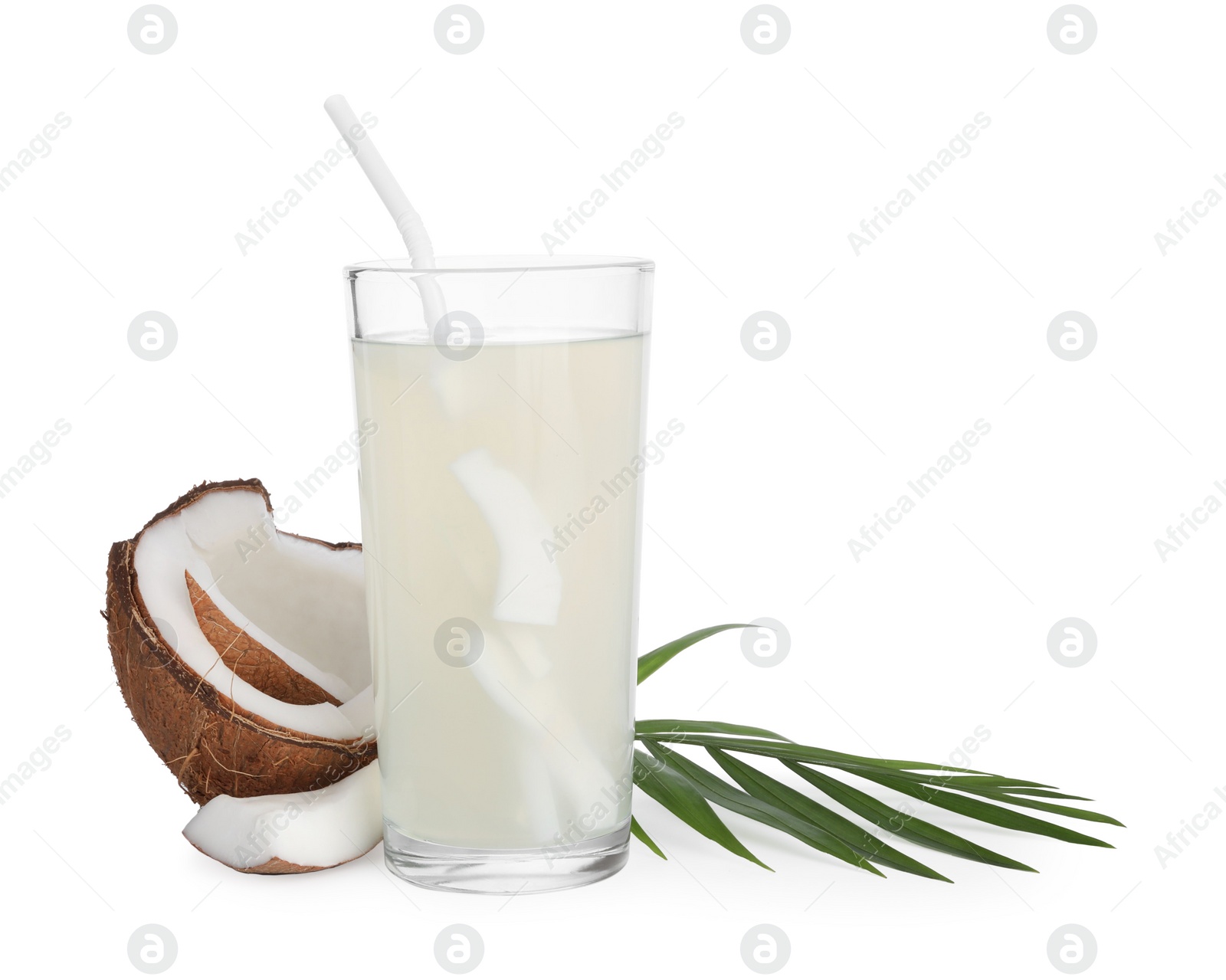 Photo of Glass of coconut water, leaf and nut isolated on white