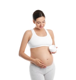 Photo of Pregnant woman holding body cream on white background