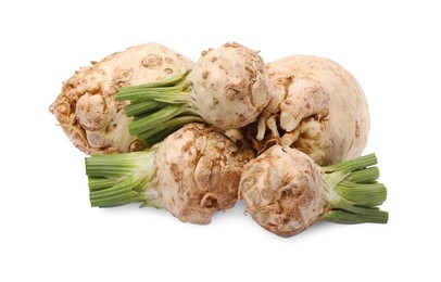 Many raw celery roots isolated on white