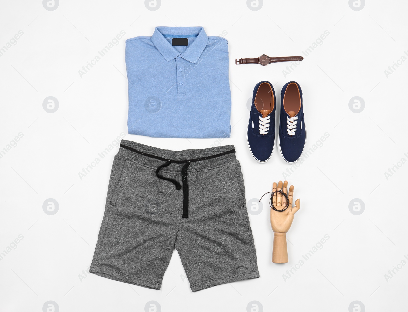 Photo of Set of stylish clothes and accessories on white background, flat lay