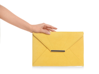 Photo of Woman holding stylish envelope bag on white background, closeup