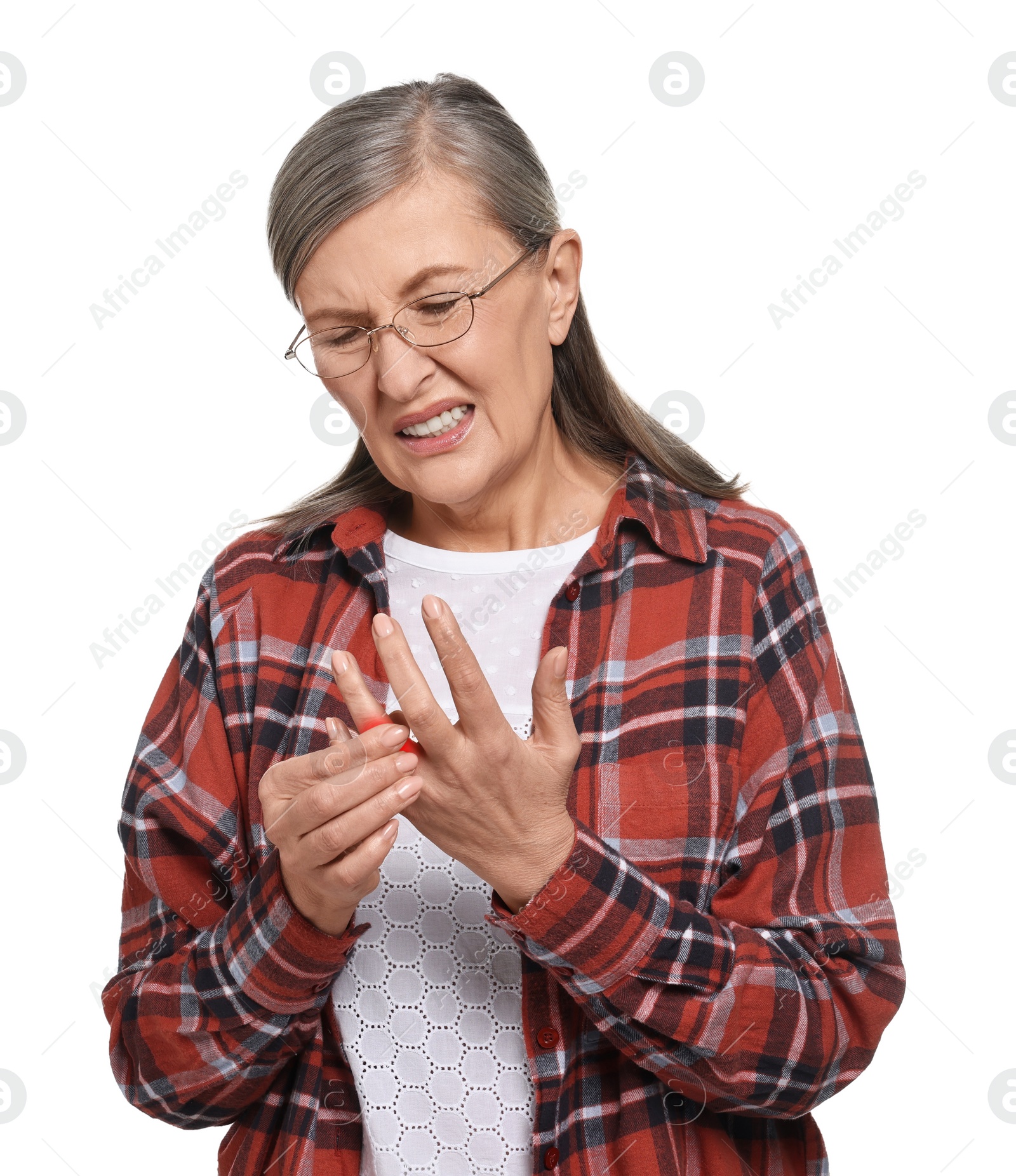 Image of Senior woman suffering from pain in finger on white background