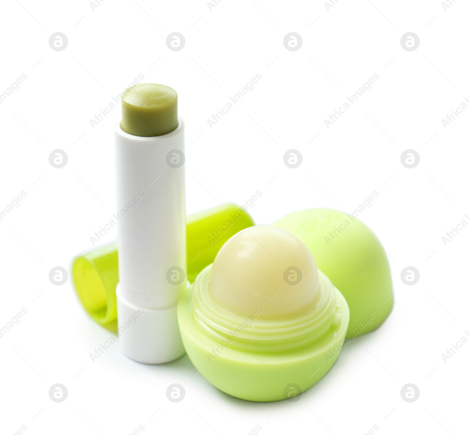 Photo of Hygienic lipstick and balm on white background