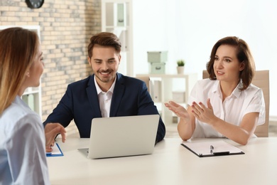 Human resources commission conducting job interview with applicant in office