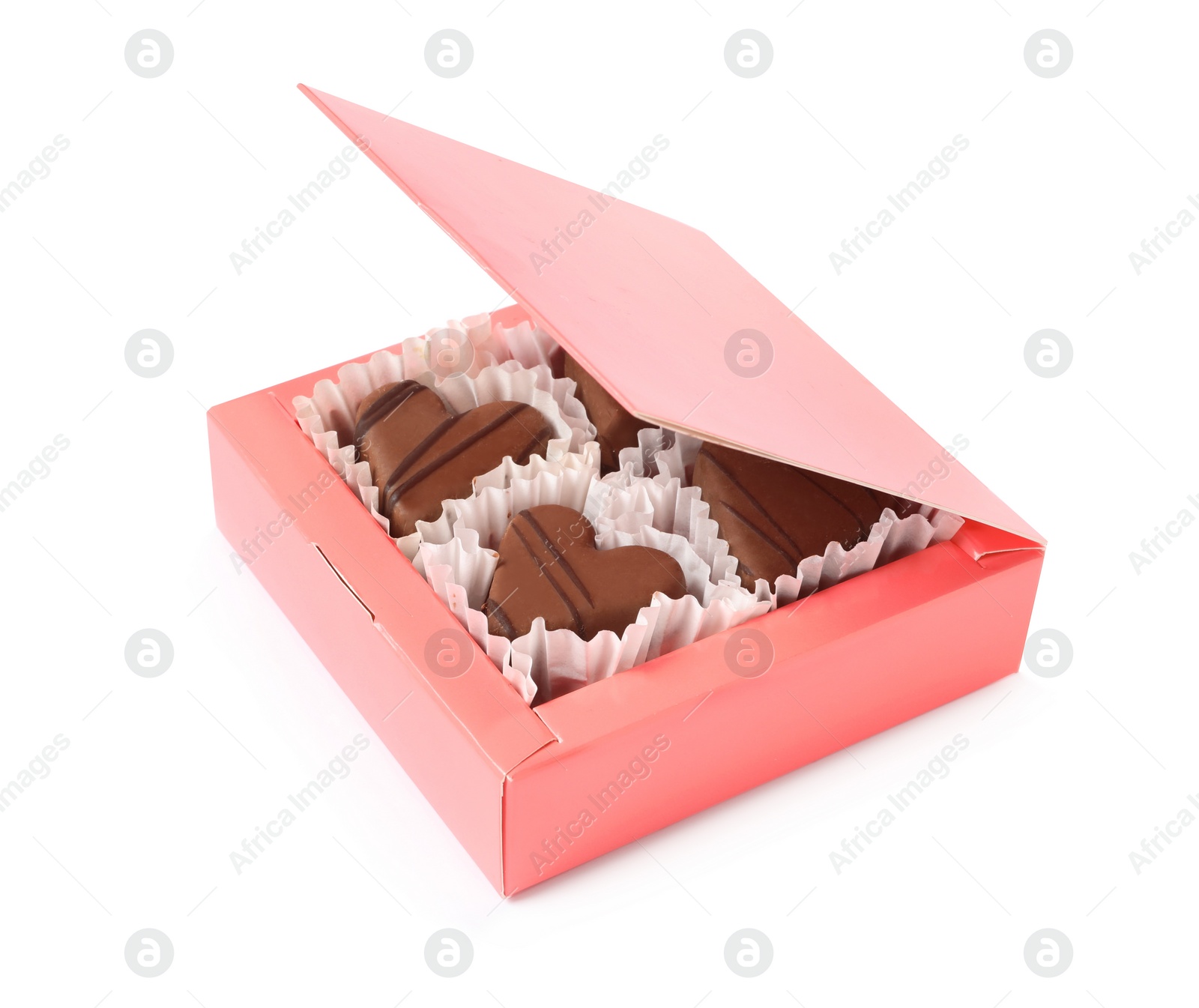 Photo of Delicious heart shaped chocolate candies in box isolated on white