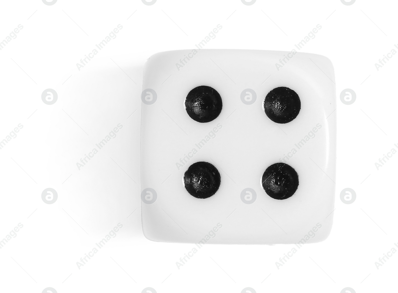 Photo of One game dice isolated on white, top view