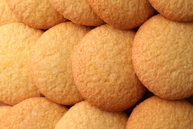 Photo of Delicious butter cookies as background, top view