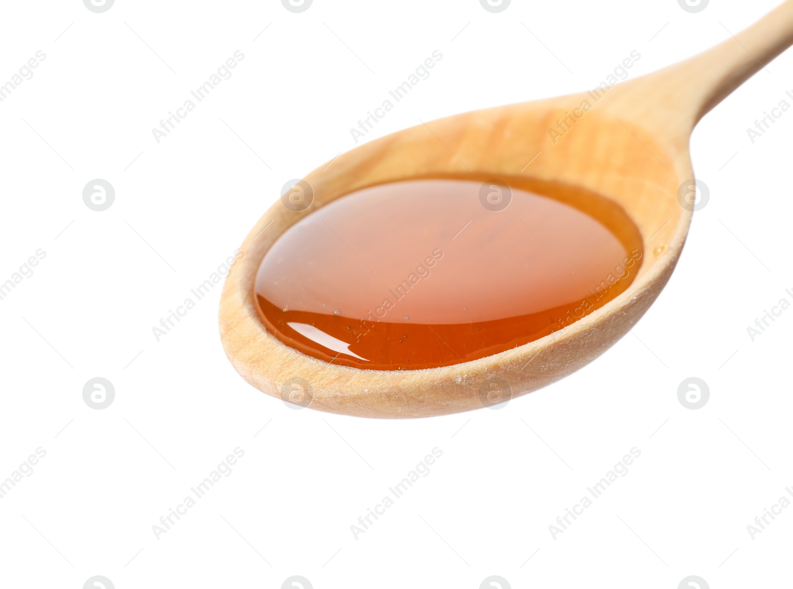 Photo of Spoon with delicious honey on white background