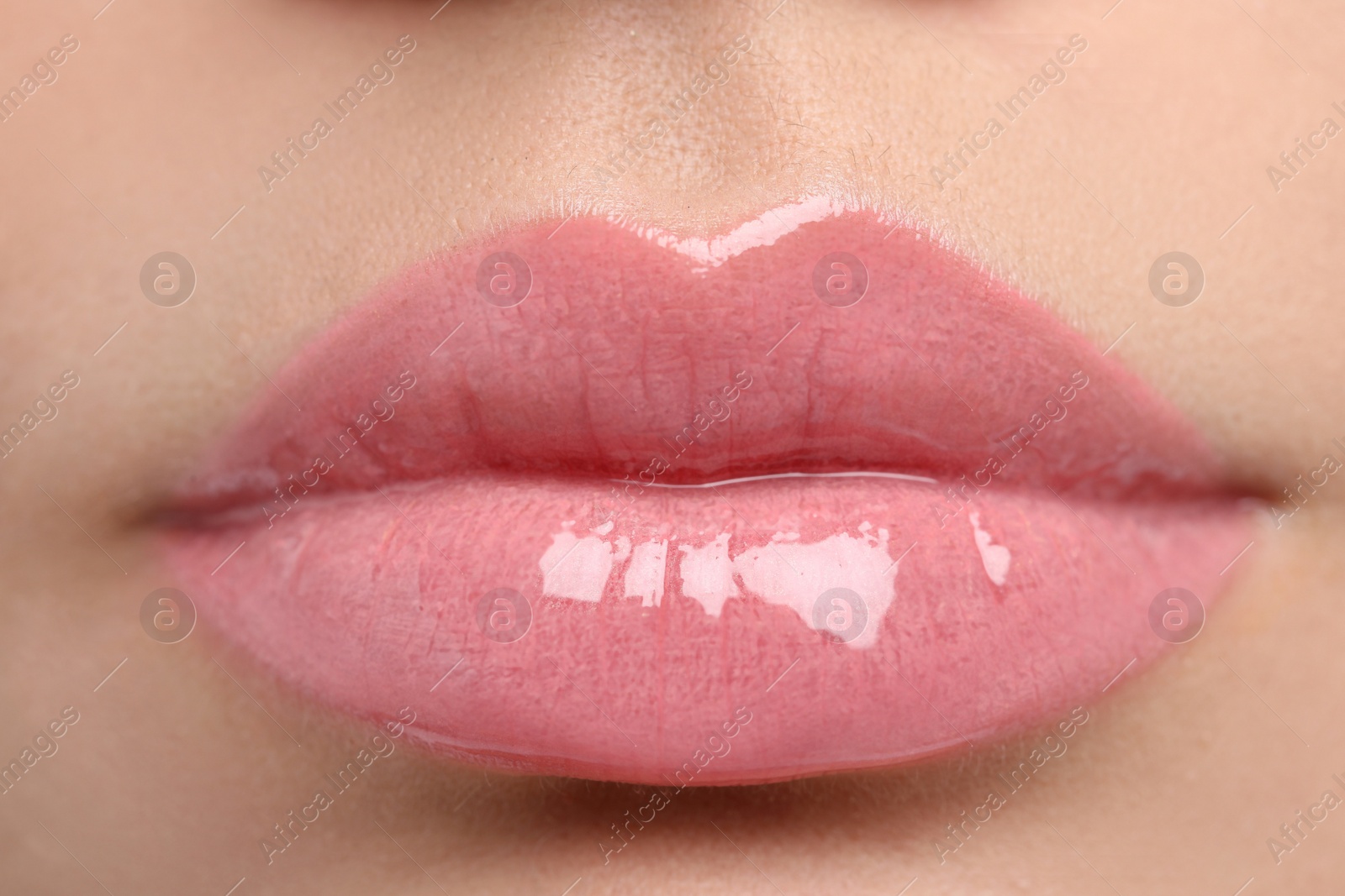 Photo of Closeup view of woman with beautiful full lips