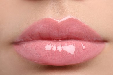 Photo of Closeup view of woman with beautiful full lips