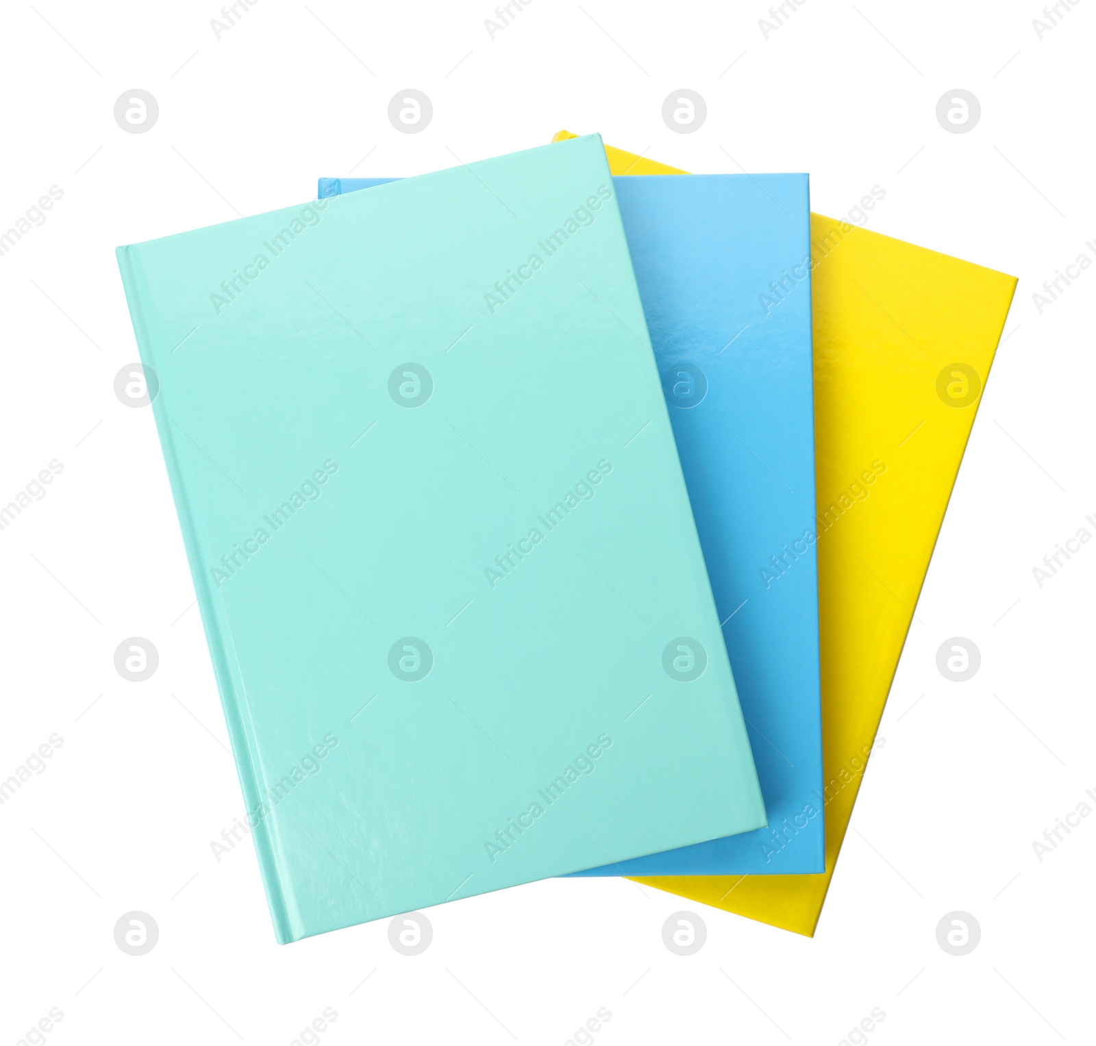 Photo of Different colorful hardcover planners on white background, top view