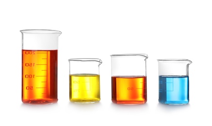 Photo of Laboratory glassware with color liquids on white background