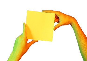 Photo of Man holding sheet of paper on white background, closeup and space for text. Color tone effect