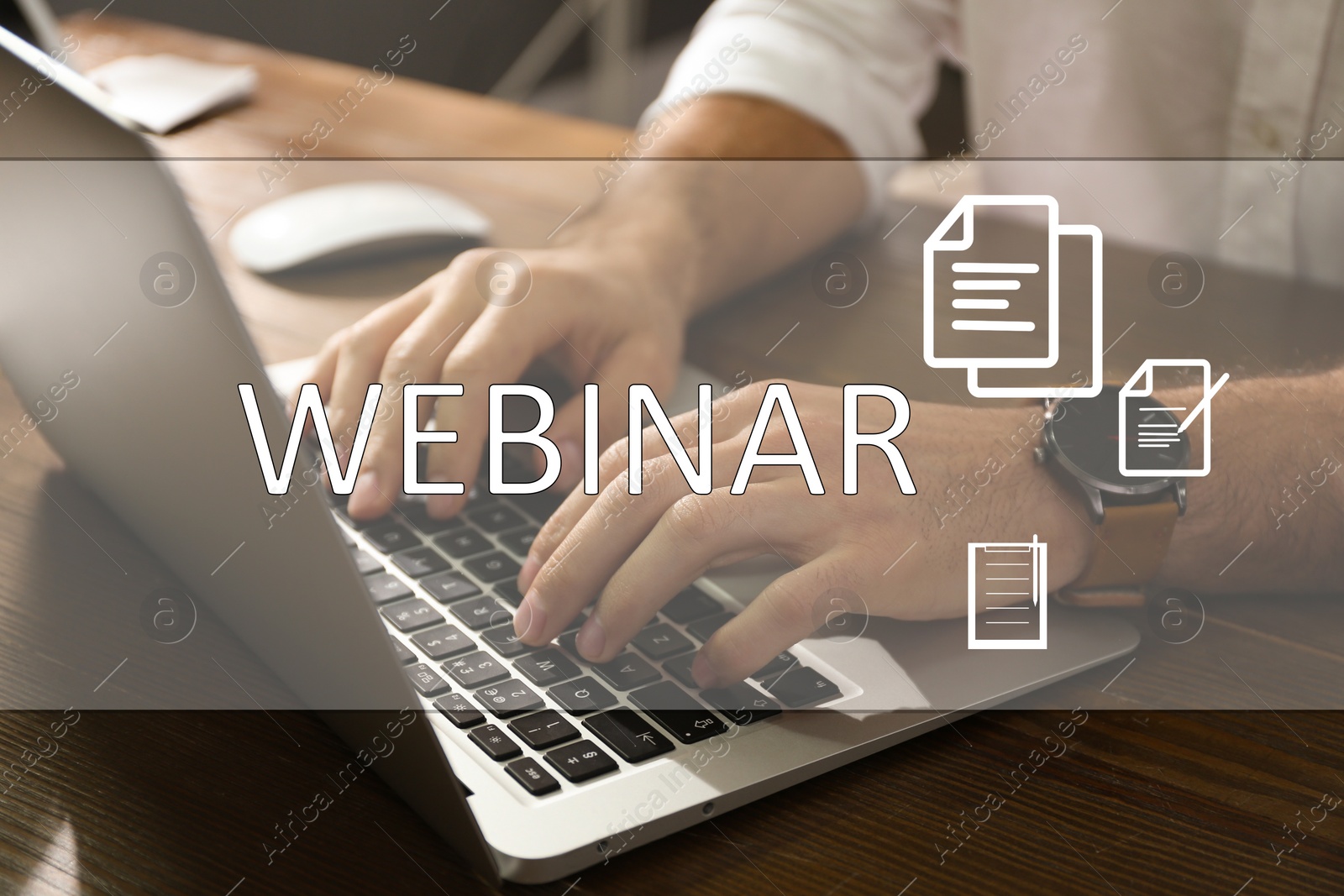 Image of Webinar concept. Man working with laptop at table indoors, closeup