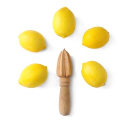 Tasty fresh lemon and wooden squeezer on white background, top view