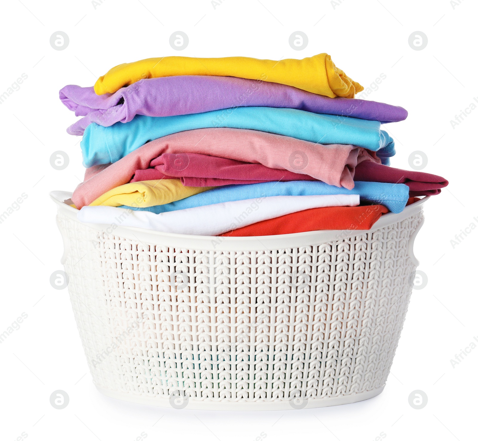 Photo of Plastic laundry basket with clean clothes on white background