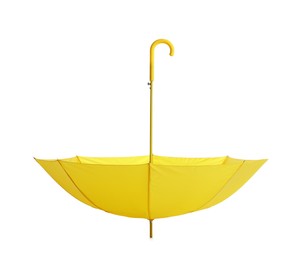 Stylish open yellow umbrella isolated on white